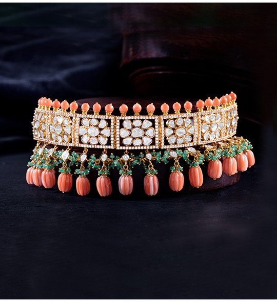 Polki choker necklace with carved Corals and  Emeralds in yellow gold