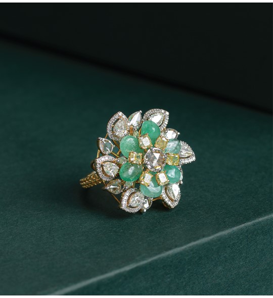 Diamond and Emerald Rings in Flower motif