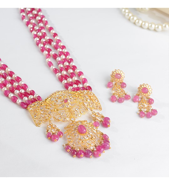 Indian gold pearl necklace sets in Floral Motif