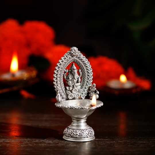 Silver Ganesh Diya with Floral and Peacock Design