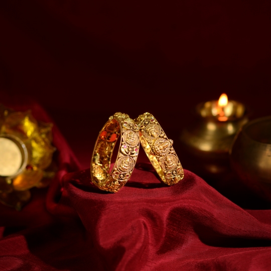 Temple-Style Gold Bangles with Deity Engravings