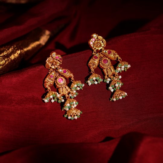 Gold Dangling Earrings with Ruby Accents