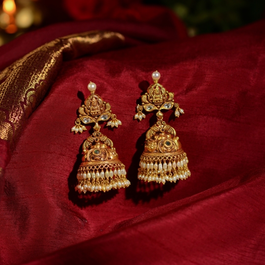 Gold Jhumka Earrings with Laxmi Motif