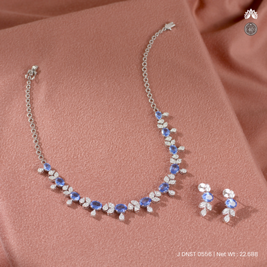 A delicate Diamond Necklace And Earrings Crafted In Floral Pattern