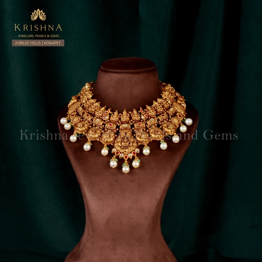 Beautiful 22k Gold Peacock and Laxmi Devi Themed Choker with Pearls